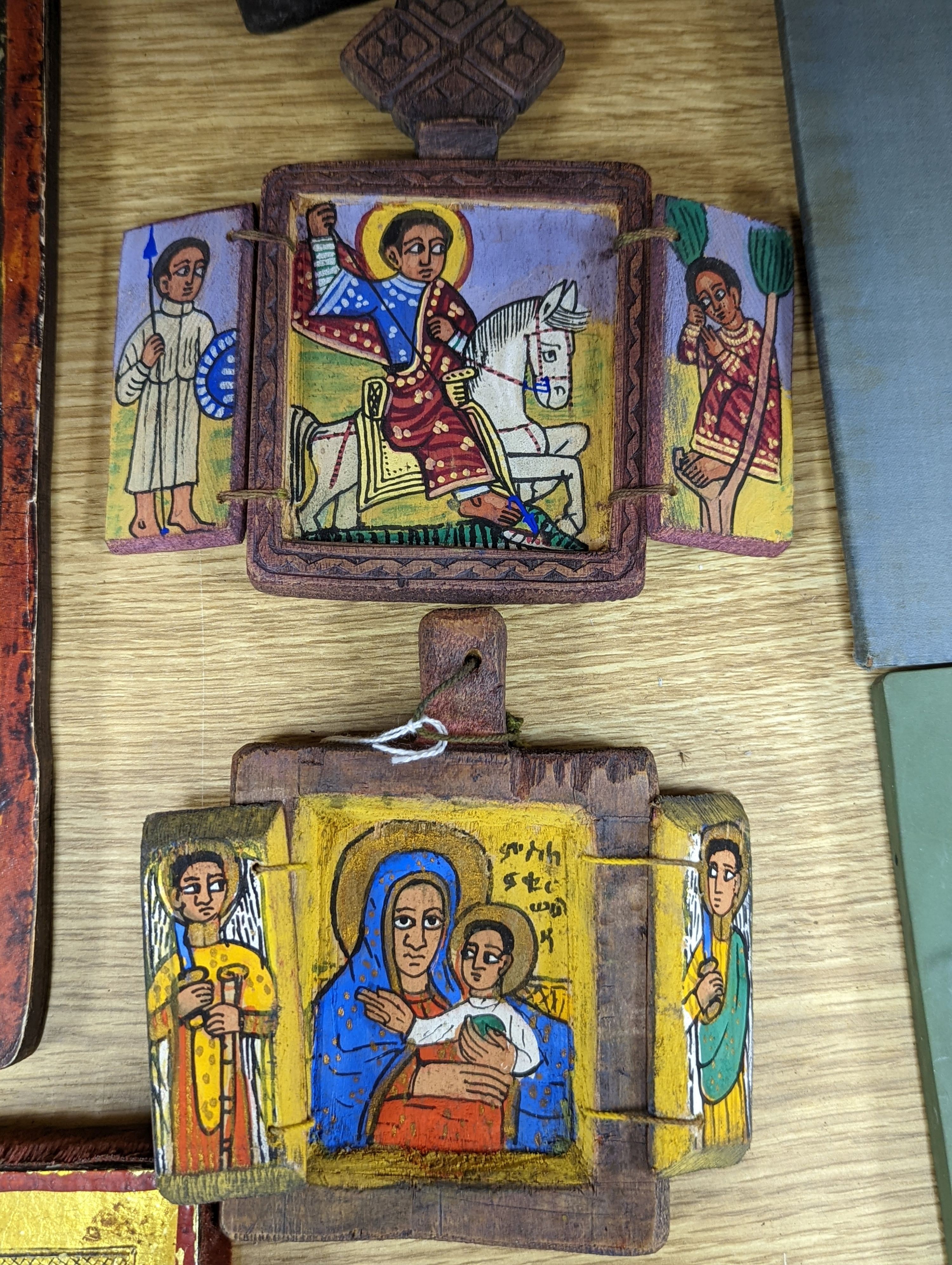 A group of nine assorted icons, largest 37 x 28cm